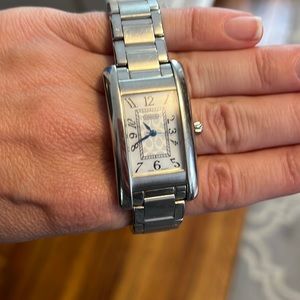 Silver Coach watch. Good condition- minor wear and tear.